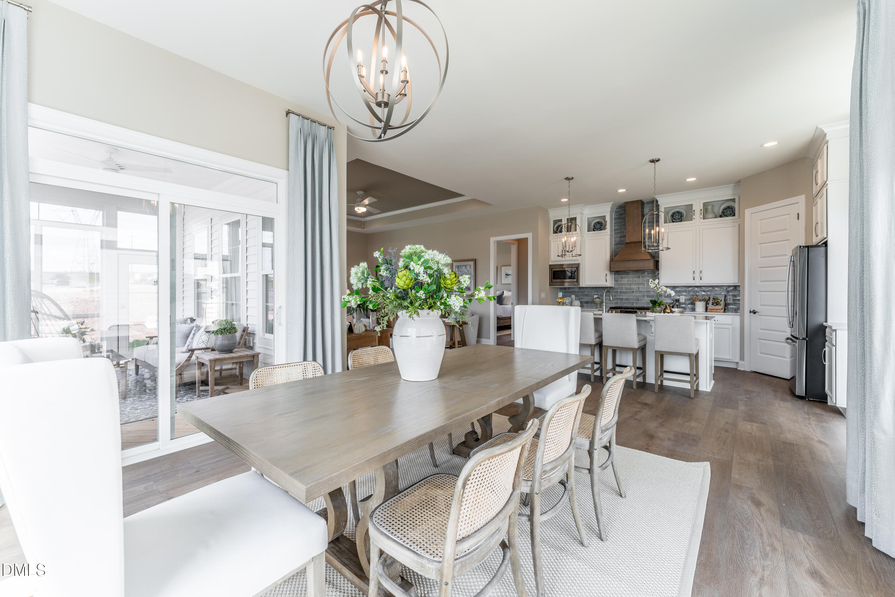331 Oak Meadow Lane Angier, NC 27501 - Photo 9 of 32 a view of a dining room with furniture window and wooden floor