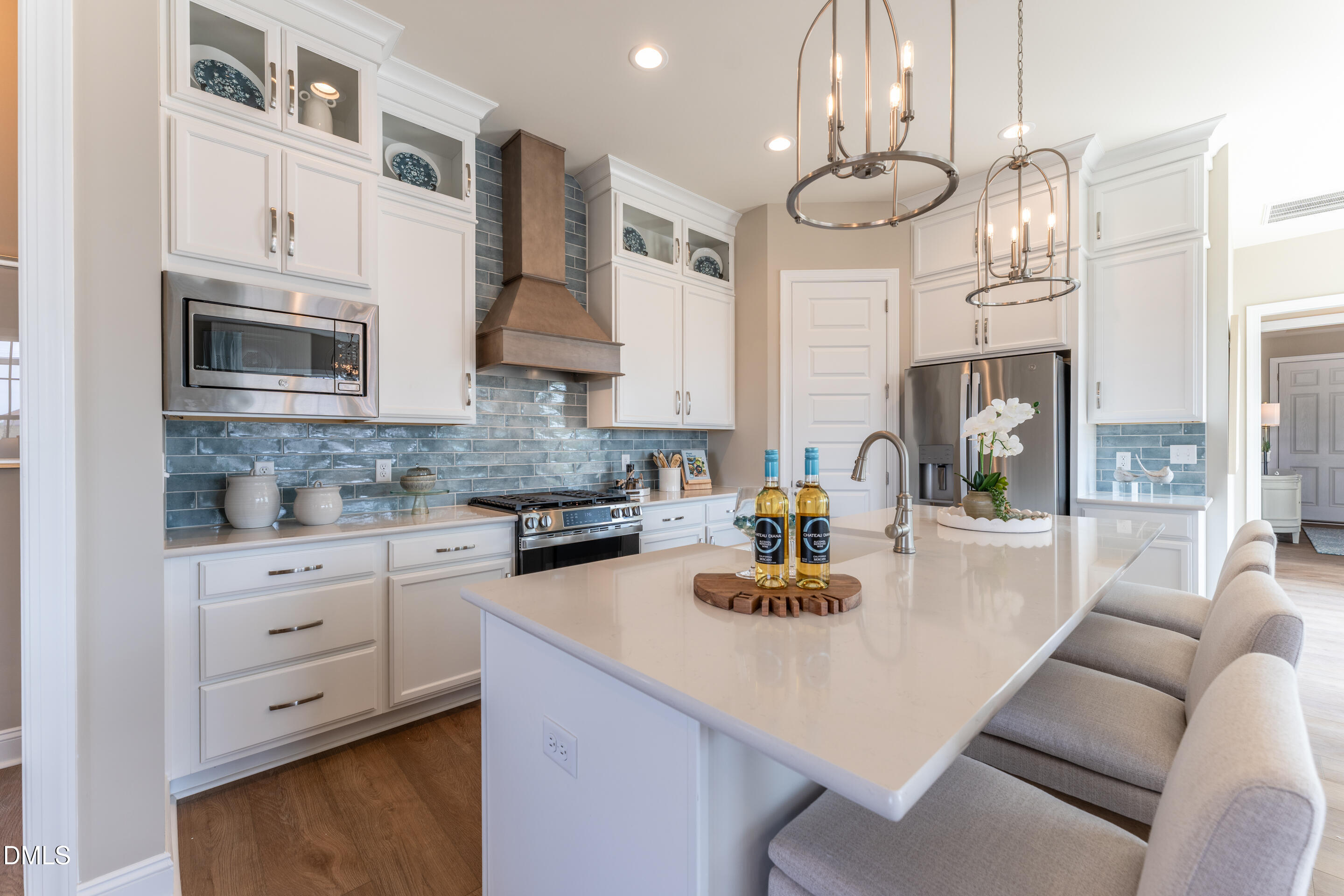 331 Oak Meadow Lane Angier, NC 27501 - Photo 10 of 32 a kitchen with stainless steel appliances granite countertop a sink a stove and a cabinets