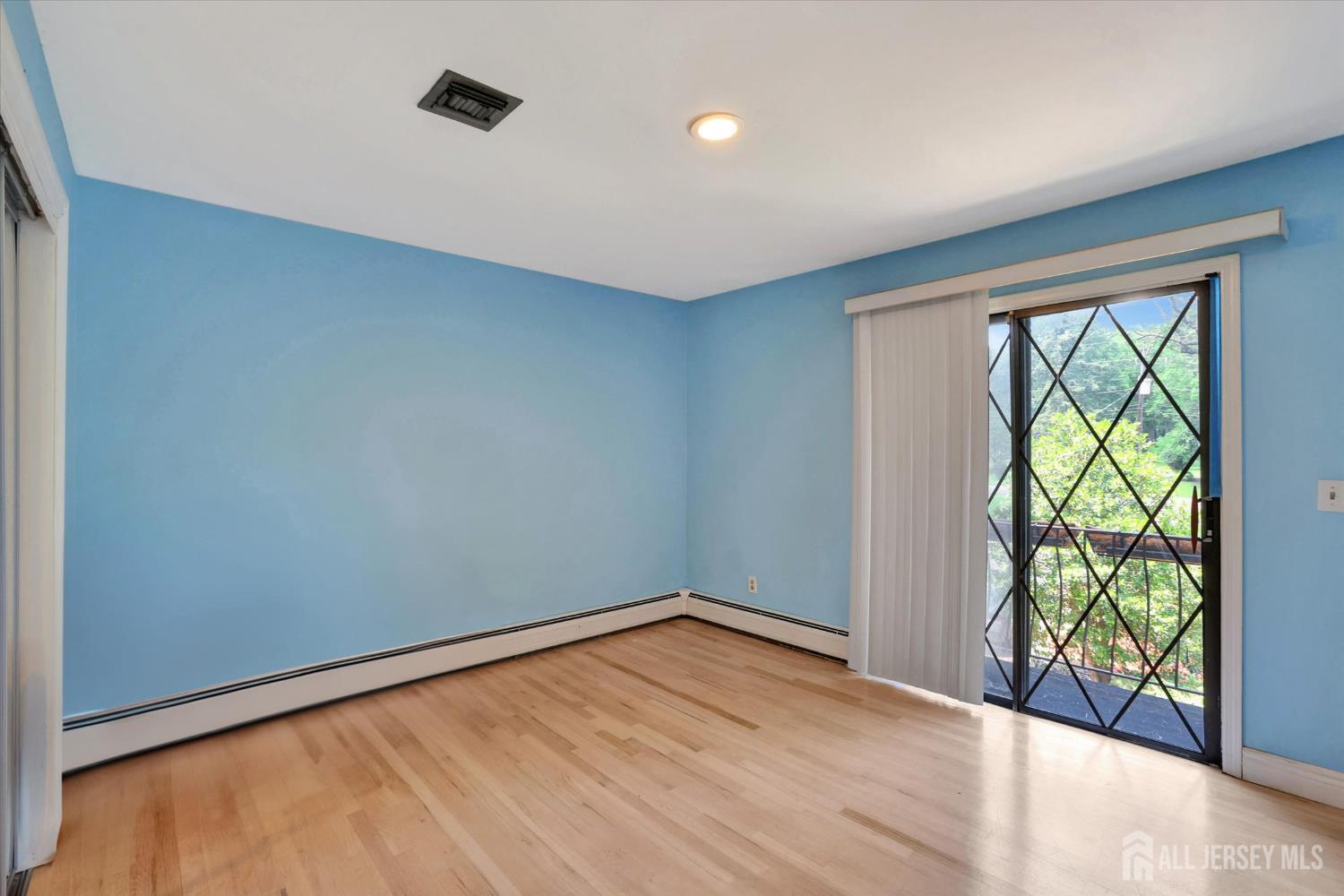 403 New Dover Road Colonia, NJ 07067 - Photo 28 of 51 an empty room with window