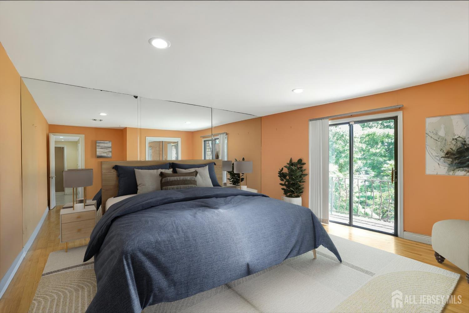 403 New Dover Road Colonia, NJ 07067 - Photo 32 of 51 a bedroom with a large bed and a large window