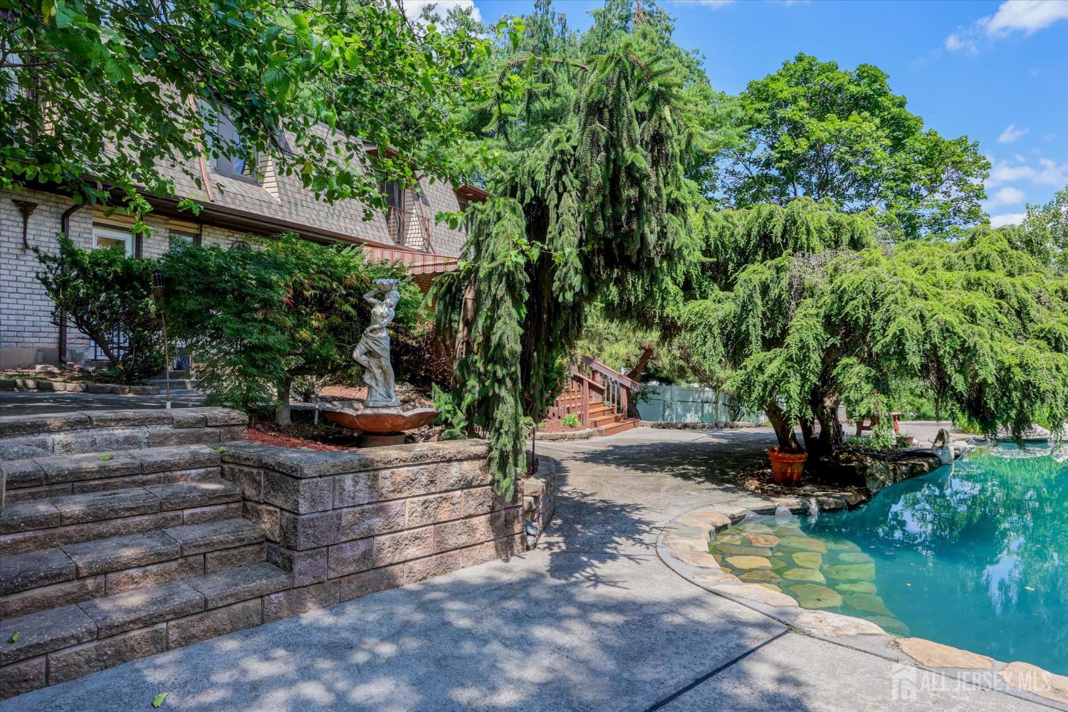 403 New Dover Road Colonia, NJ 07067 - Photo 46 of 51 a view of a backyard with sitting area