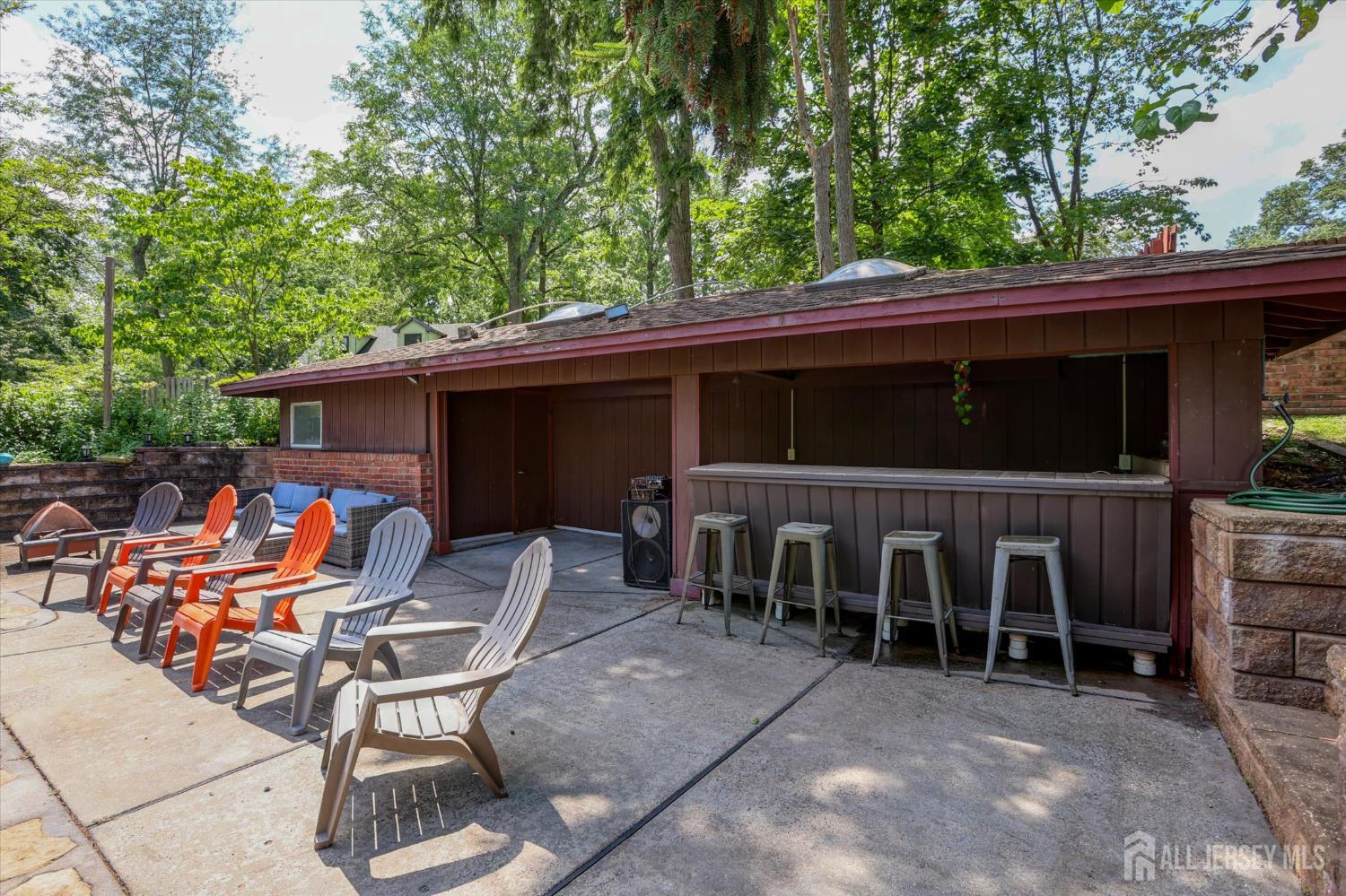403 New Dover Road Colonia, NJ 07067 - Photo 47 of 51 a view of backyard with outdoor seating and plants
