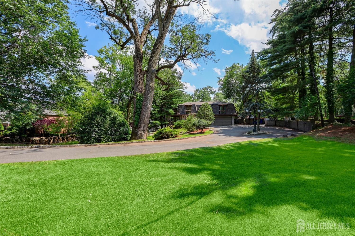 403 New Dover Road Colonia, NJ 07067 - Photo 5 of 51 a garden view with outdoor seating