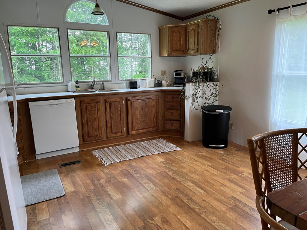 23701 Range Road Union City, PA 16438 - Photo 12 of 33 a kitchen with stainless steel appliances granite countertop a sink stove and cabinets