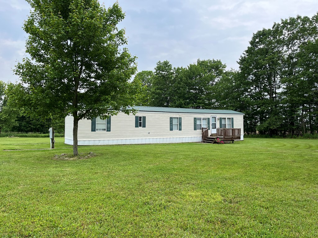 23701 Range Road Union City, PA 16438 - Photo 2 of 33 a house with a outdoor space