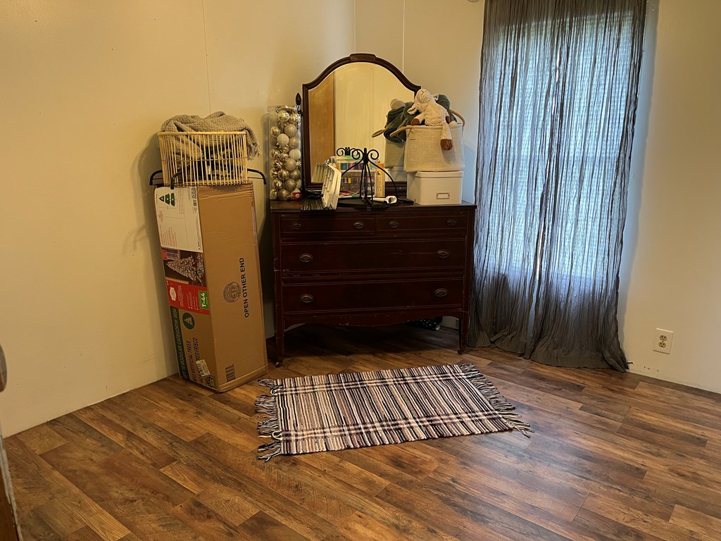 23701 Range Road Union City, PA 16438 - Photo 22 of 33 a view of a bedroom with wooden floor