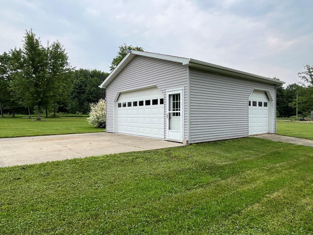 23701 Range Road Union City, PA 16438 - Photo 29 of 33 a view of a backyard with a garden