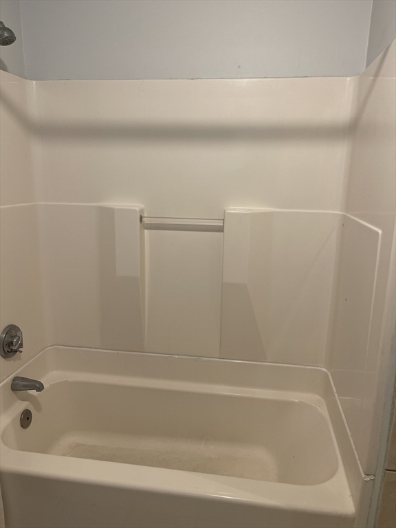 50 Chestnut Street Lynn, MA 01902 - Photo 13 of 13 a bathroom with a bathtub