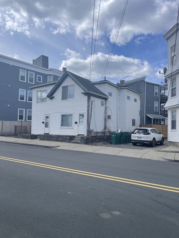 50 Chestnut Street Lynn, MA 01902 - Photo 2 of 13 a house with a outdoor space