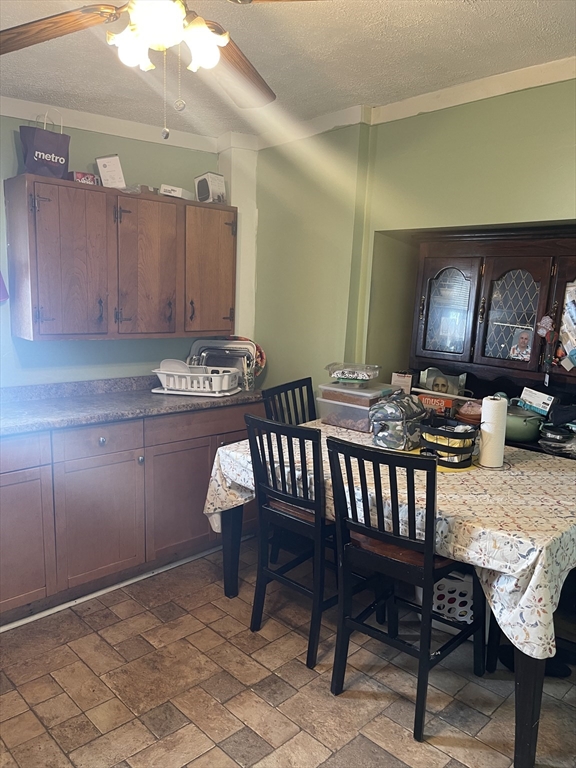 50 Chestnut Street Lynn, MA 01902 - Photo 4 of 13 a view of a dining room with furniture