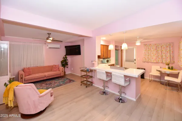 a kitchen with a stove a sink and a refrigerator