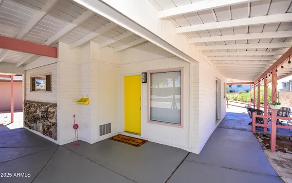 a view of a building with sitting area