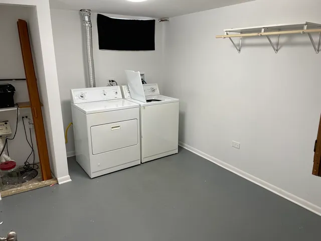 a side view of a house with a yard