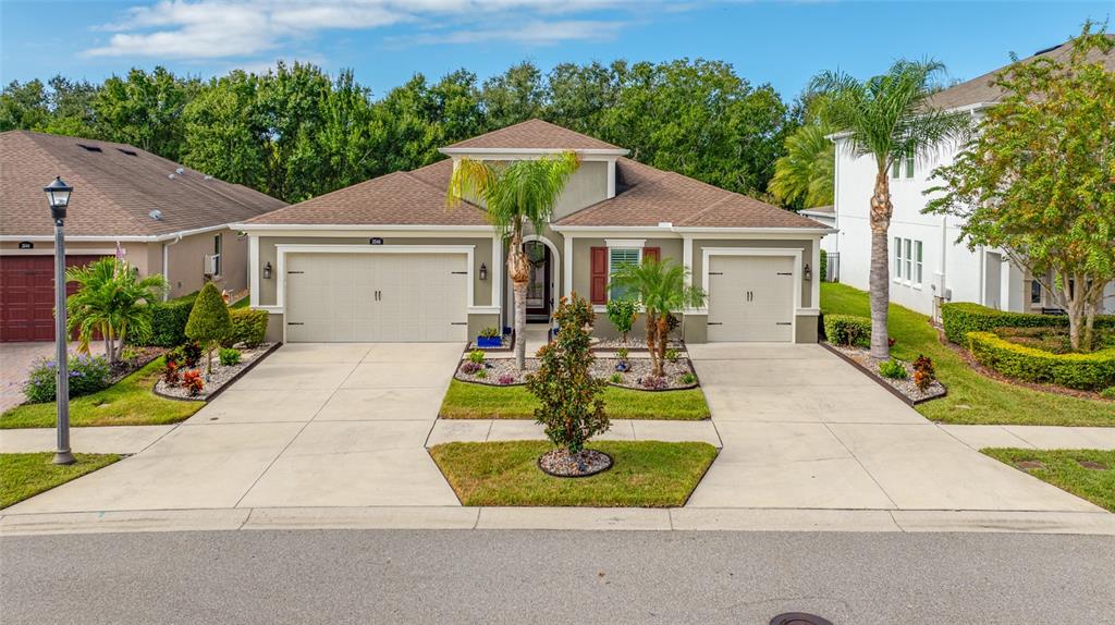 3546 Wicket Field Road Lutz, FL 33548 - Photo 1 of 1 a view of a house with entertaining space