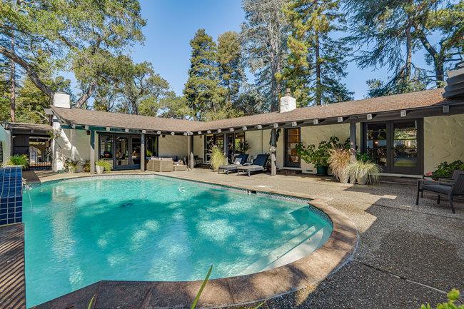 1 Edge Road Atherton, CA 94027 - Photo 26 of 33 a view of a patio with table and chairs potted plants and large tree