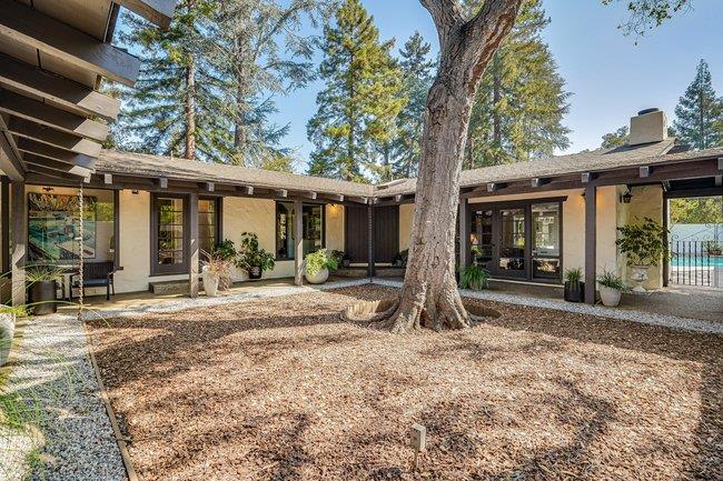 1 Edge Road Atherton, CA 94027 - Photo 5 of 33 a view of a house with backyard porch and sitting area