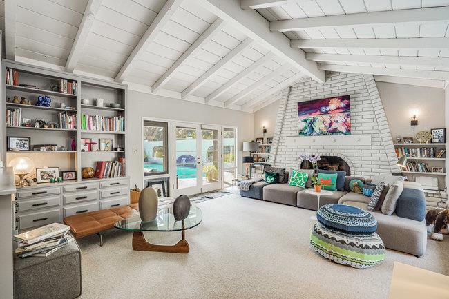 1 Edge Road Atherton, CA 94027 - Photo 7 of 33 a living room with furniture gym equipment and a fireplace