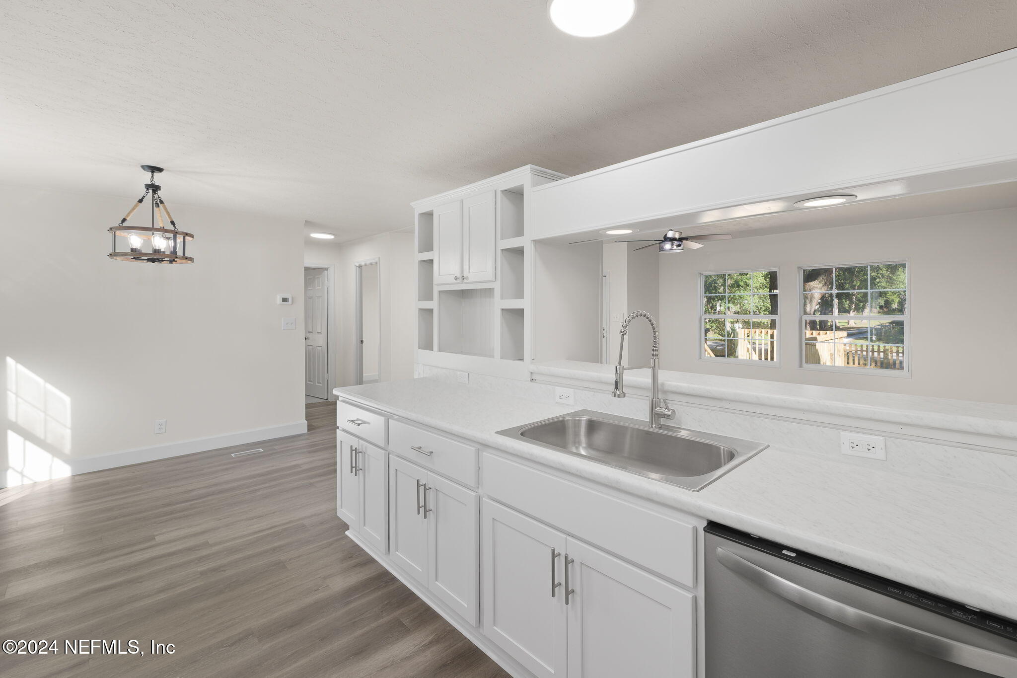 4526 Lambing Road Jacksonville, FL 32210 - Photo 5 of 32 a kitchen with sink and cabinets