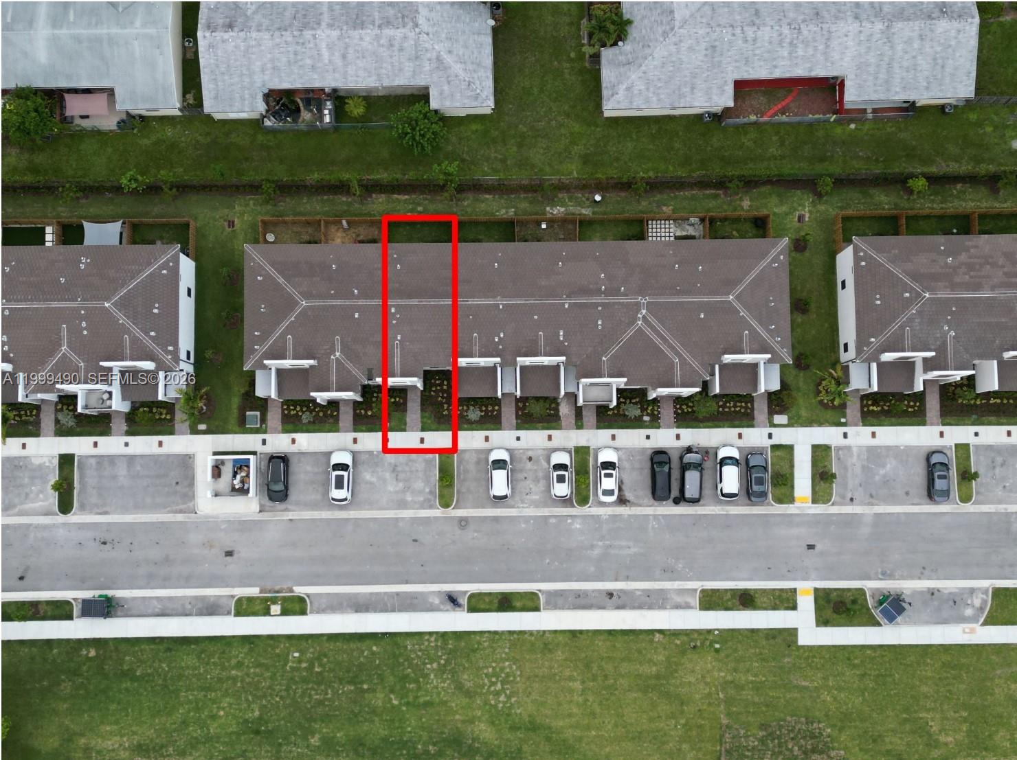 949 Northeast 211th Street Miami, FL 33179 - Photo 20 of 27 an aerial view of a house with a garden