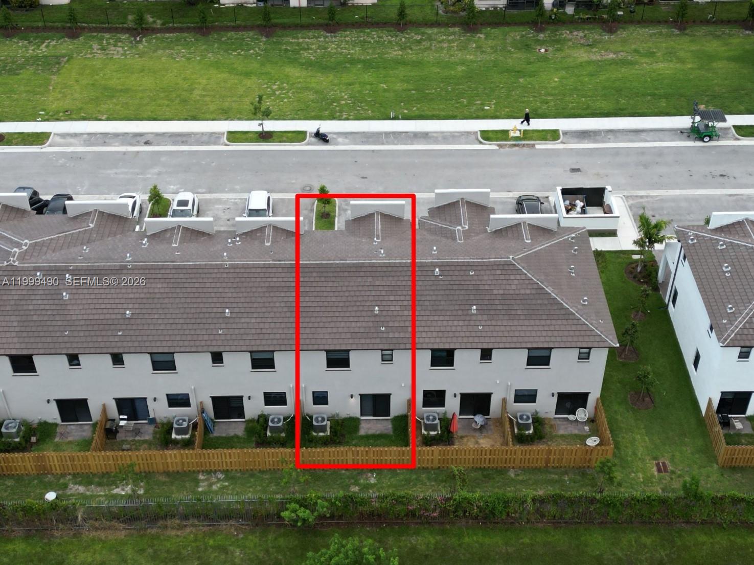 949 Northeast 211th Street Miami, FL 33179 - Photo 22 of 27 a view of building with yard