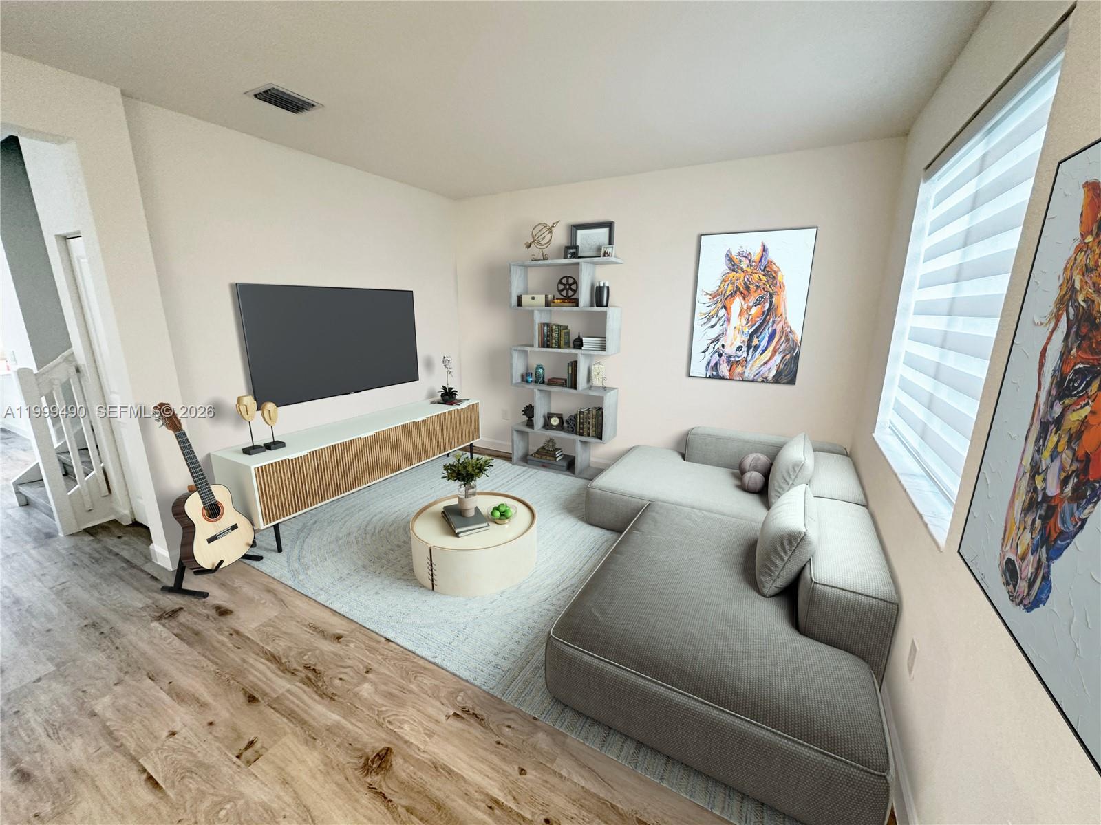 949 Northeast 211th Street Miami, FL 33179 - Photo 3 of 27 a living room with furniture and a flat screen tv