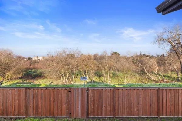 a view of a yard with mountain view