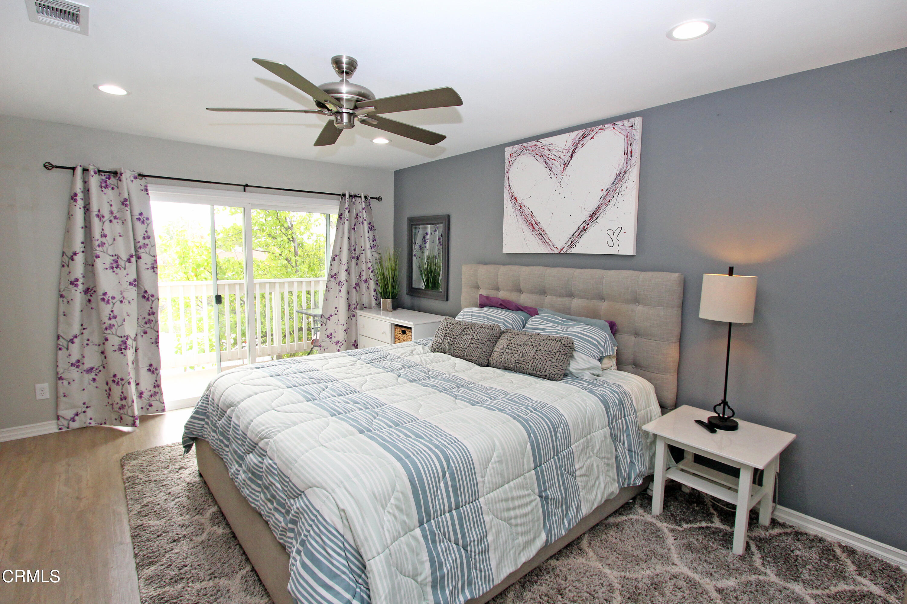 15030 Reedley Street, Unit C Moorpark, CA 93021 - Photo 34 of 51 a bedroom with a bed and a window