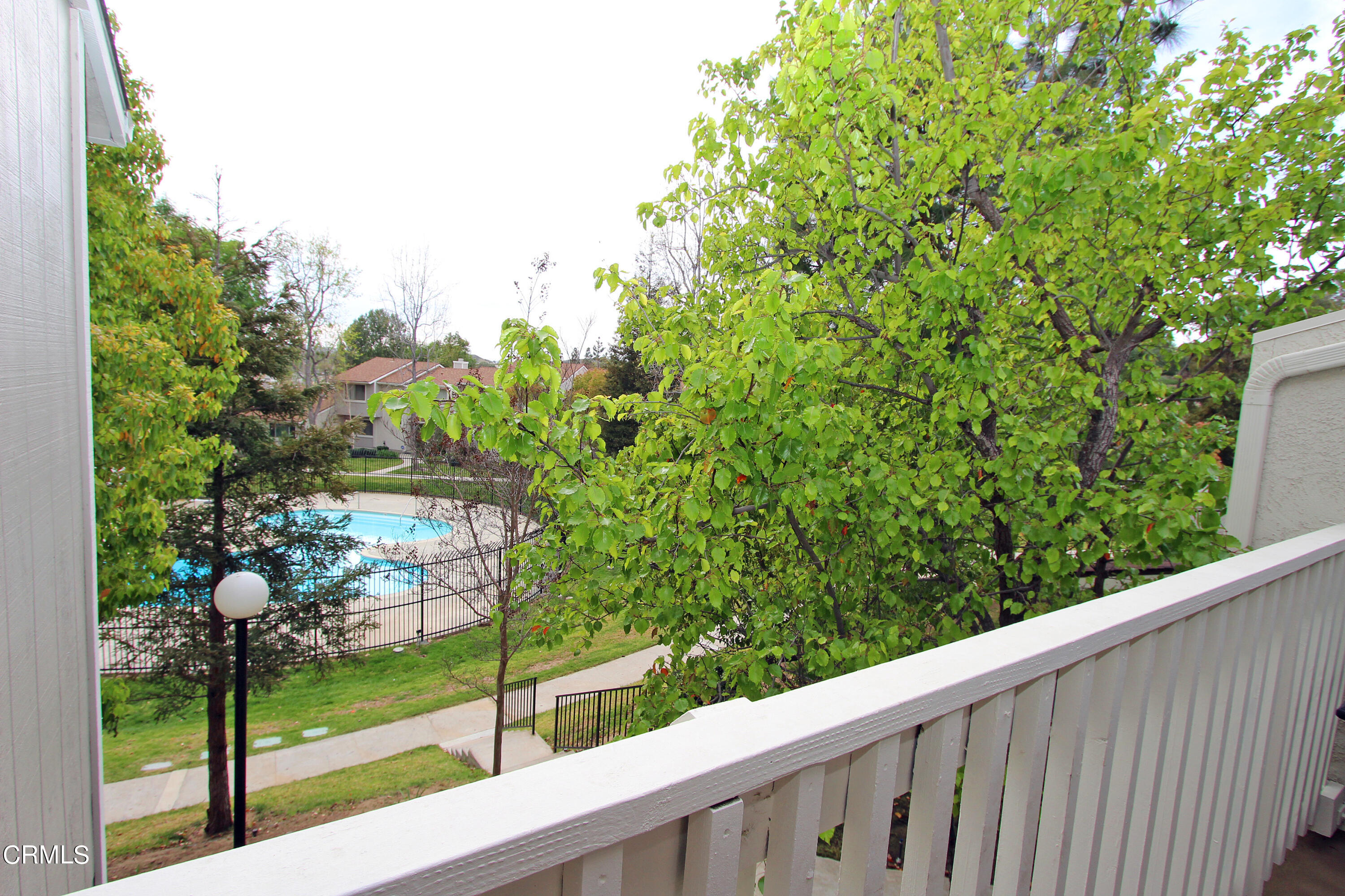 15030 Reedley Street, Unit C Moorpark, CA 93021 - Photo 36 of 51 a view of a yard from a balcony