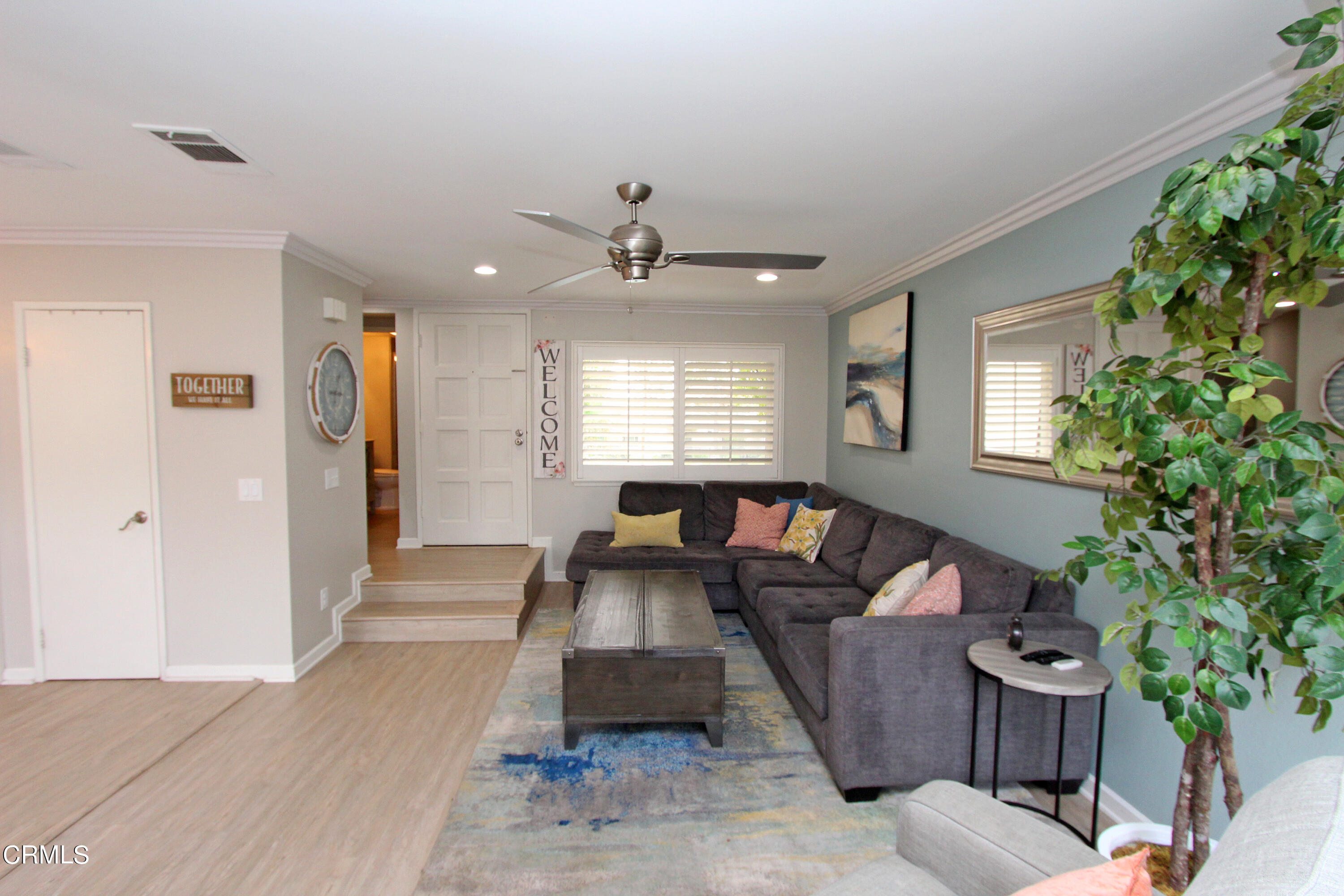 15030 Reedley Street, Unit C Moorpark, CA 93021 - Photo 7 of 51 a living room with furniture and a window