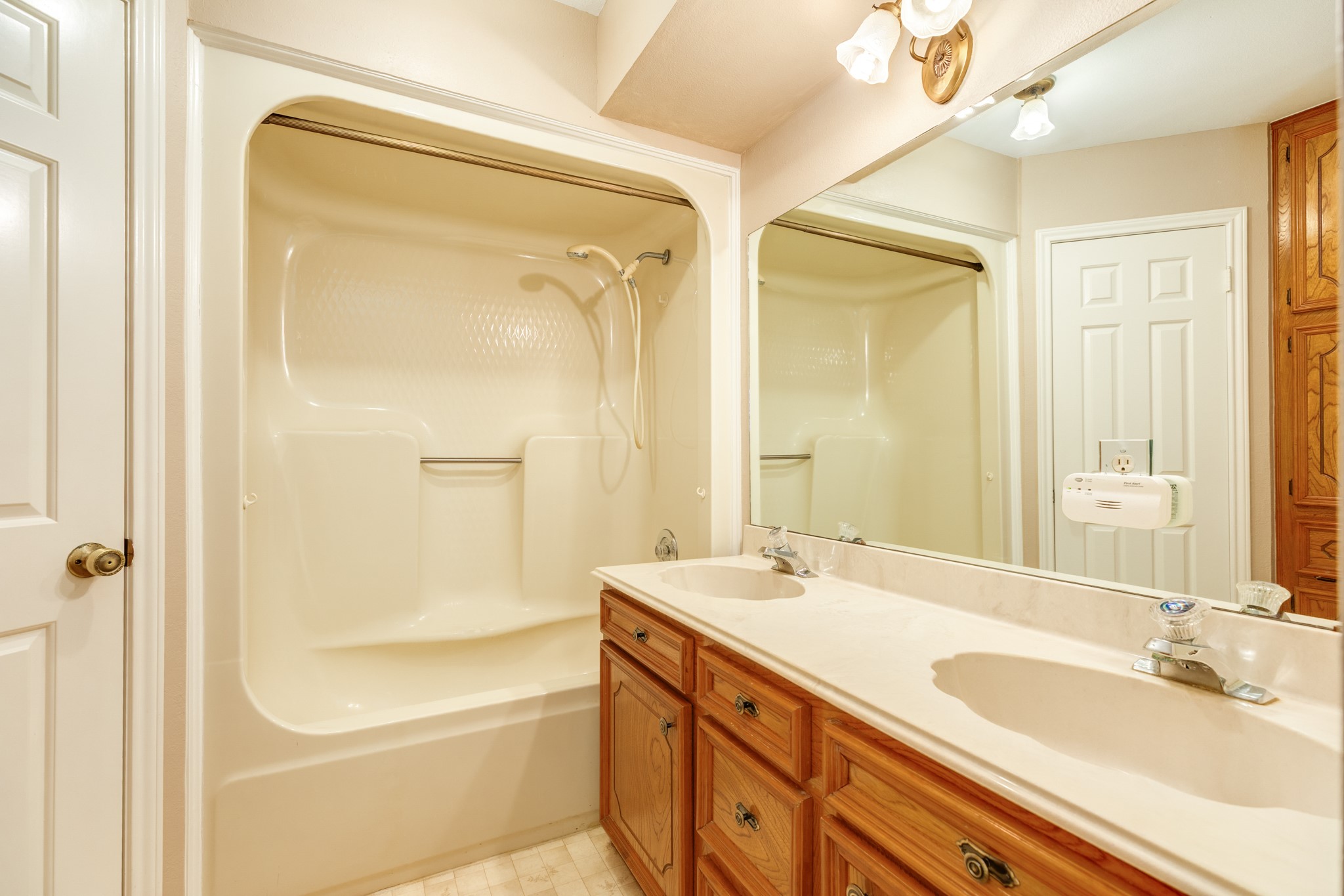 212 Any Way Street Lake Jackson, TX 77566 - Photo 24 of 28 a bathroom with a granite countertop sink mirror and a