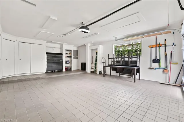 a view of a livingroom with furniture and staircase