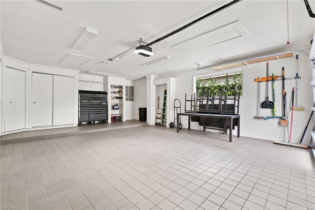 3737 Crayton Road Naples, FL 34103 - Photo 26 of 33 a view of a livingroom with furniture and staircase