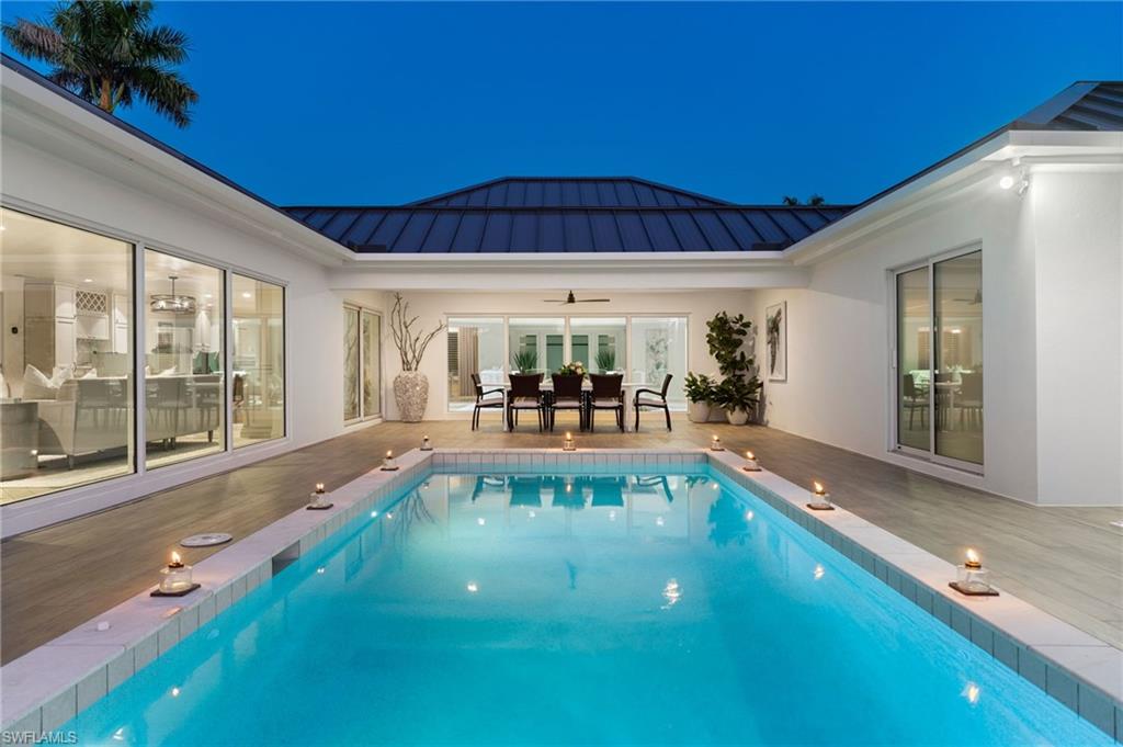 3737 Crayton Road Naples, FL 34103 - Photo 32 of 33 a view of swimming pool