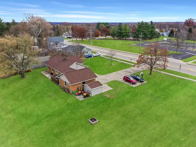 an aerial view of a house with a garden