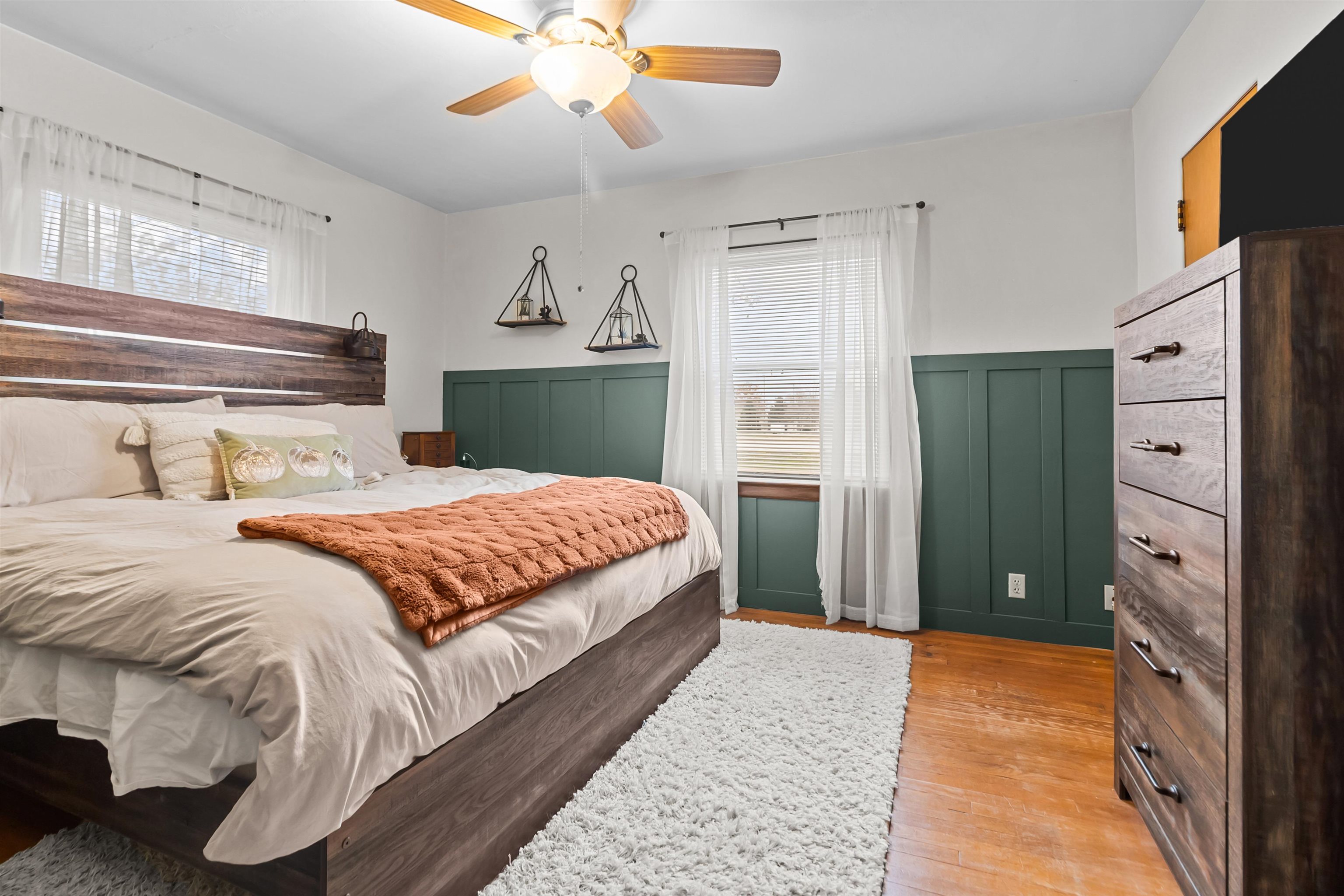 108 East Grove Street Poplar Grove, IL 61065 - Photo 16 of 30 a bedroom with a bed and a chandelier