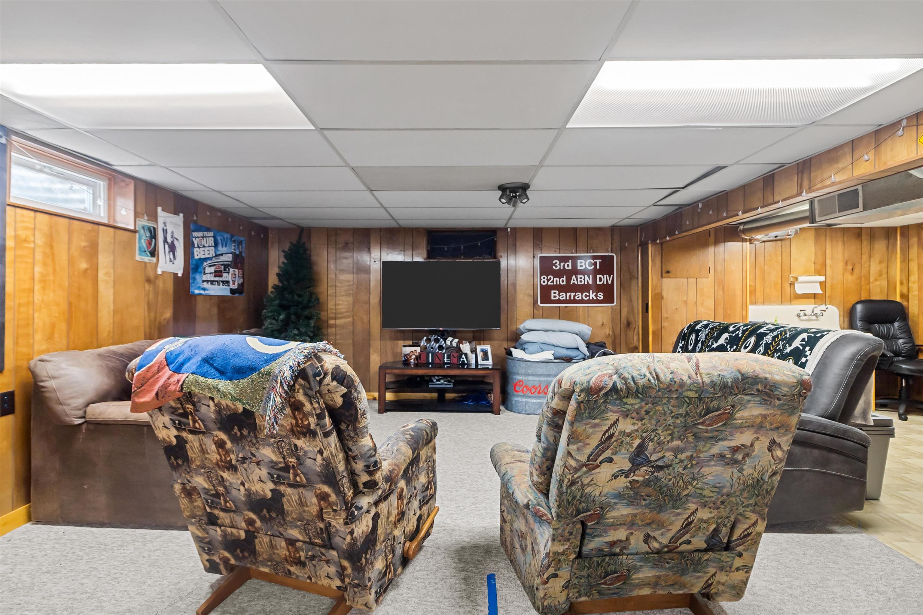 108 East Grove Street Poplar Grove, IL 61065 - Photo 21 of 30 a bed room with furniture and a flat screen tv