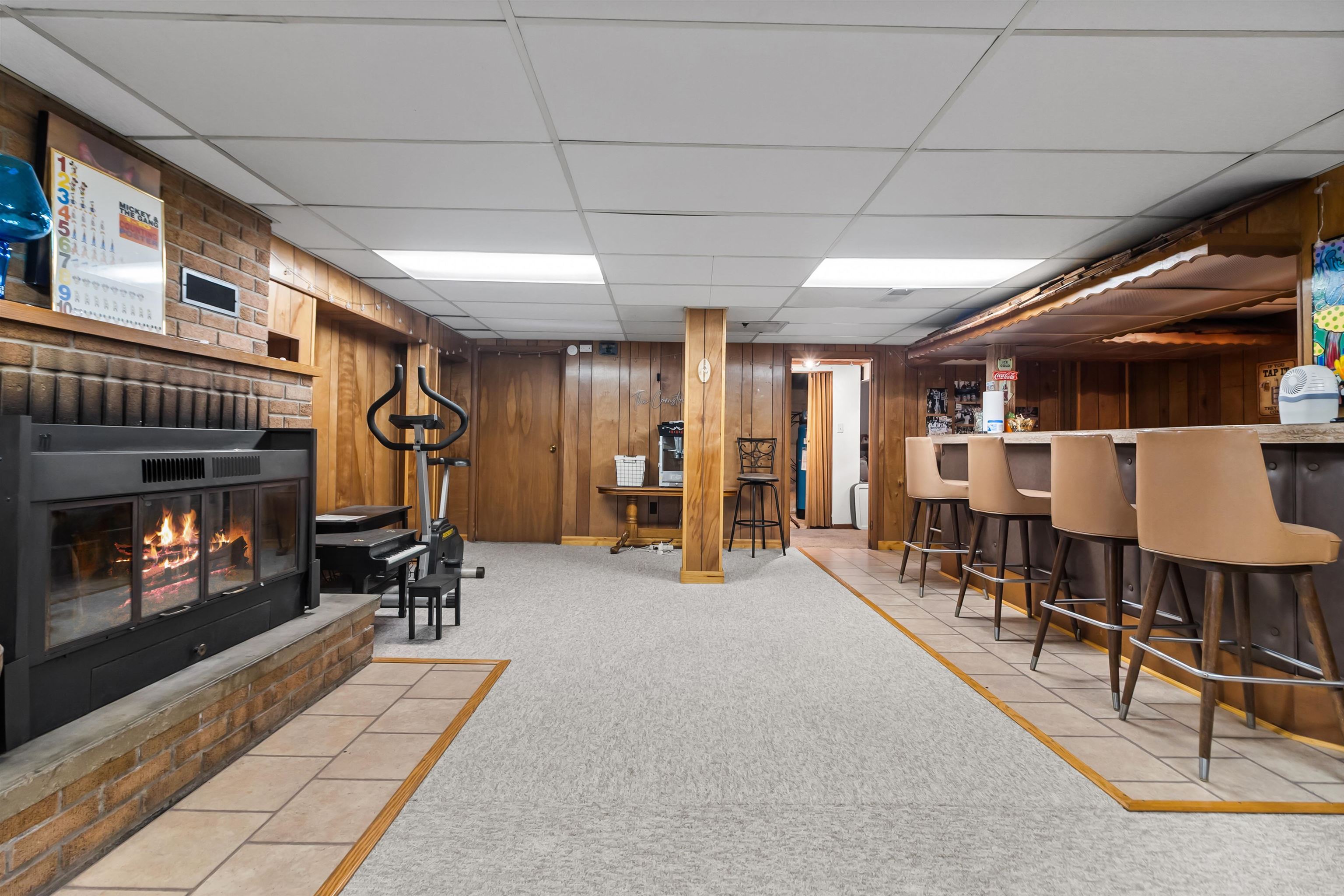 108 East Grove Street Poplar Grove, IL 61065 - Photo 22 of 30 a view of a livingroom with furniture and a fireplace