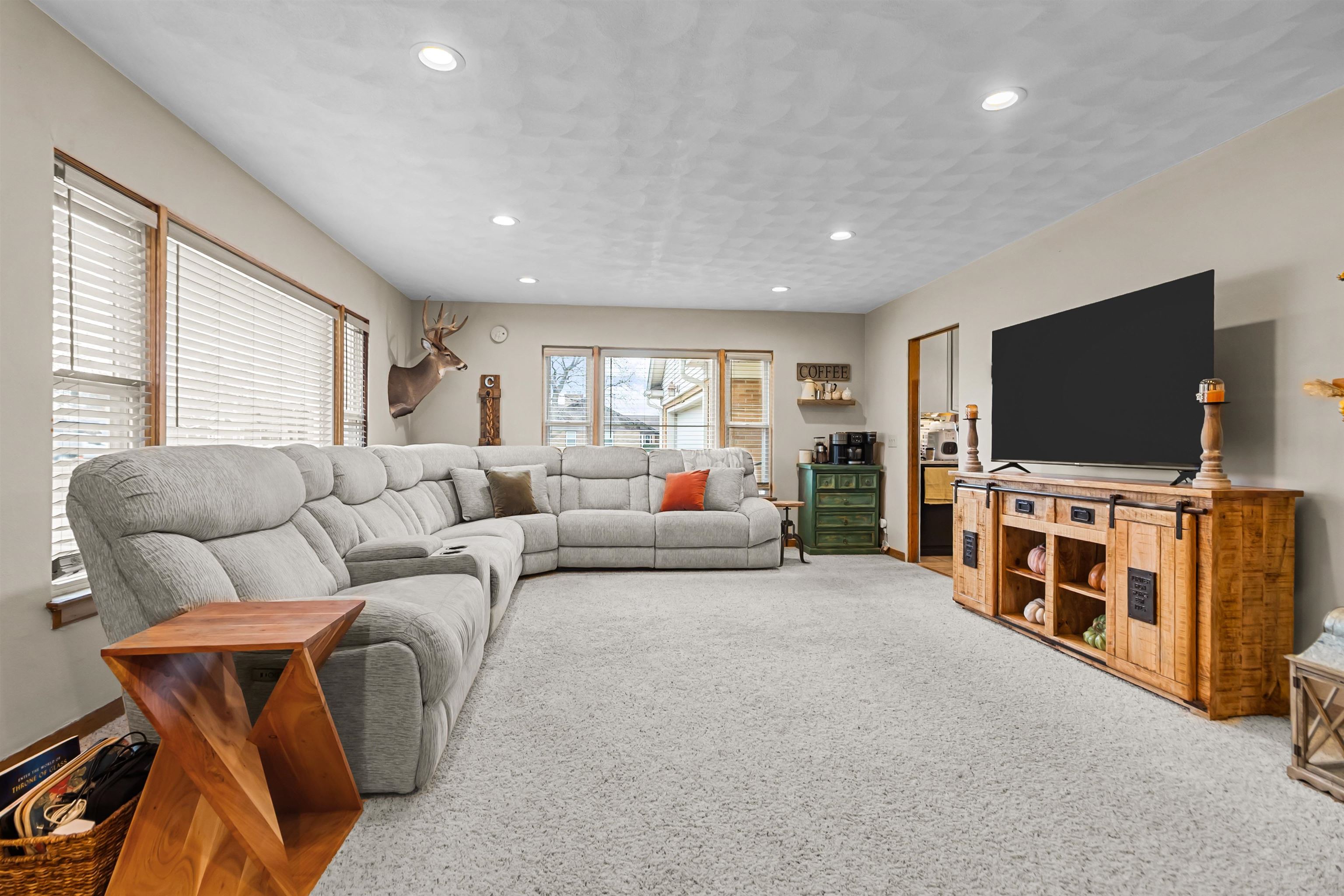108 East Grove Street Poplar Grove, IL 61065 - Photo 7 of 30 a living room with furniture and a flat screen tv