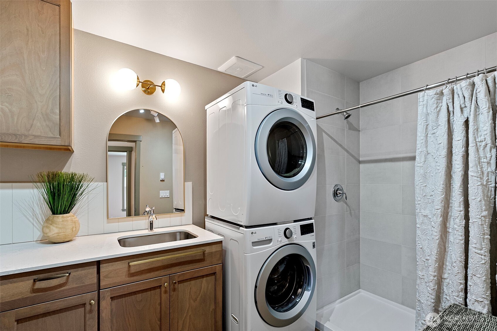503 5th Street Steilacoom, WA 98388 - Photo 20 of 40 a view of living room with washer and dryer