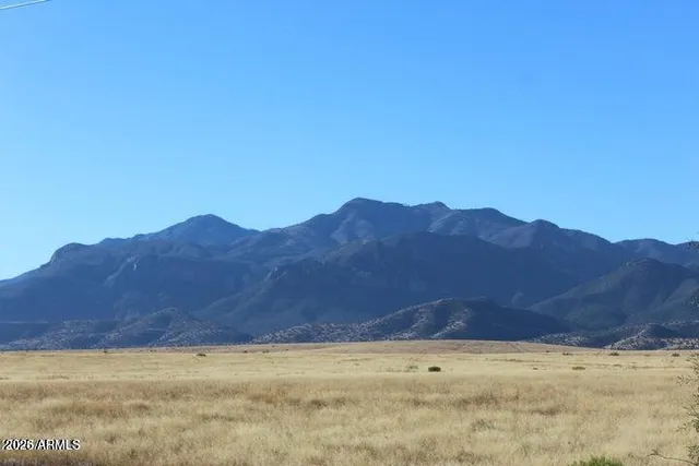 a view of a lake with mountains in the background