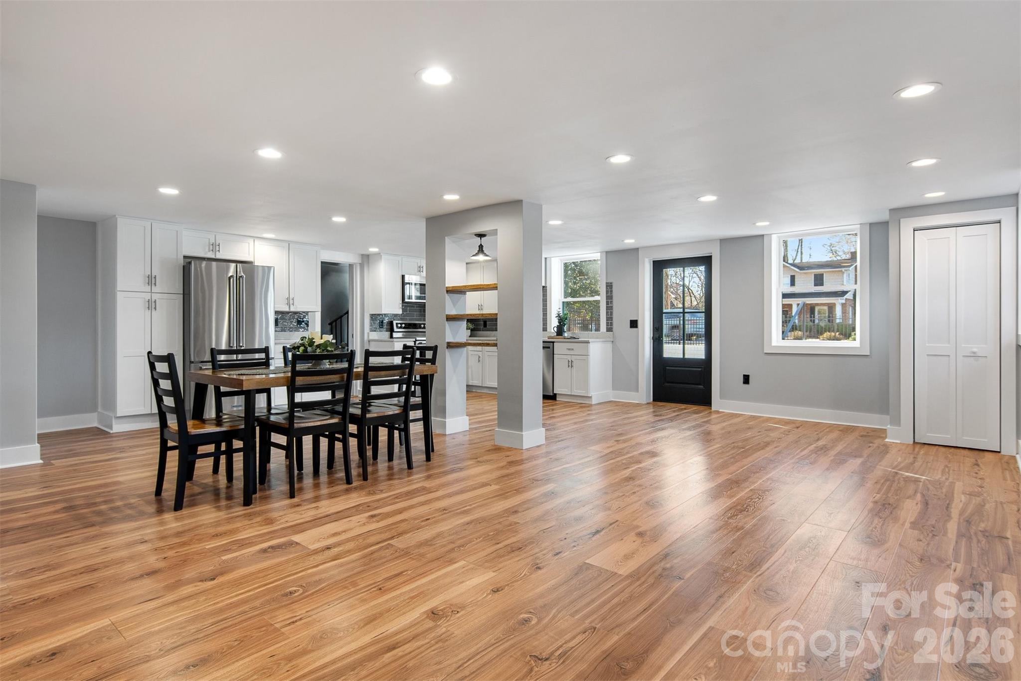 1206 9th Street Northwest Hickory, NC 28601 - Photo 24 of 40 an open kitchen with kitchen island and stainless steel appliances