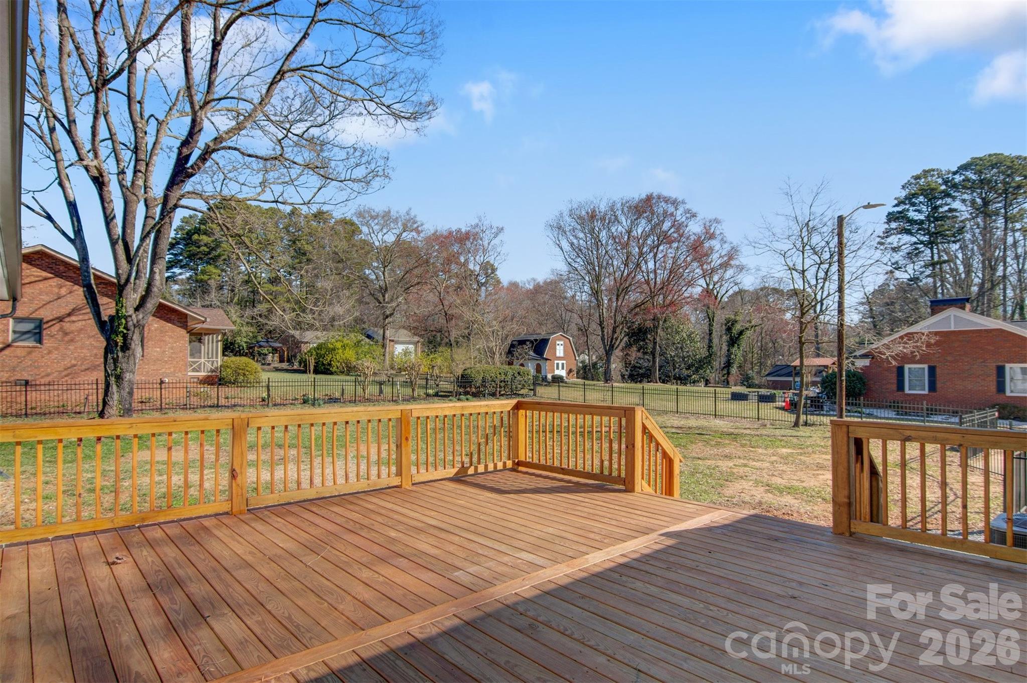 1206 9th Street Northwest Hickory, NC 28601 - Photo 36 of 40 a view of a patio with chairs and wooden floor