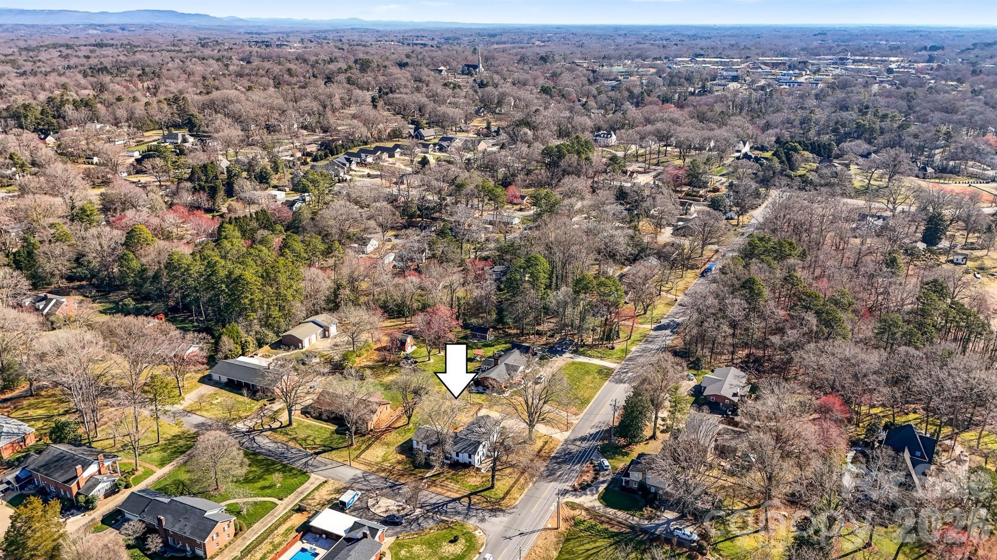 1206 9th Street Northwest Hickory, NC 28601 - Photo 40 of 40 an aerial view of house with yard and mountain view in back