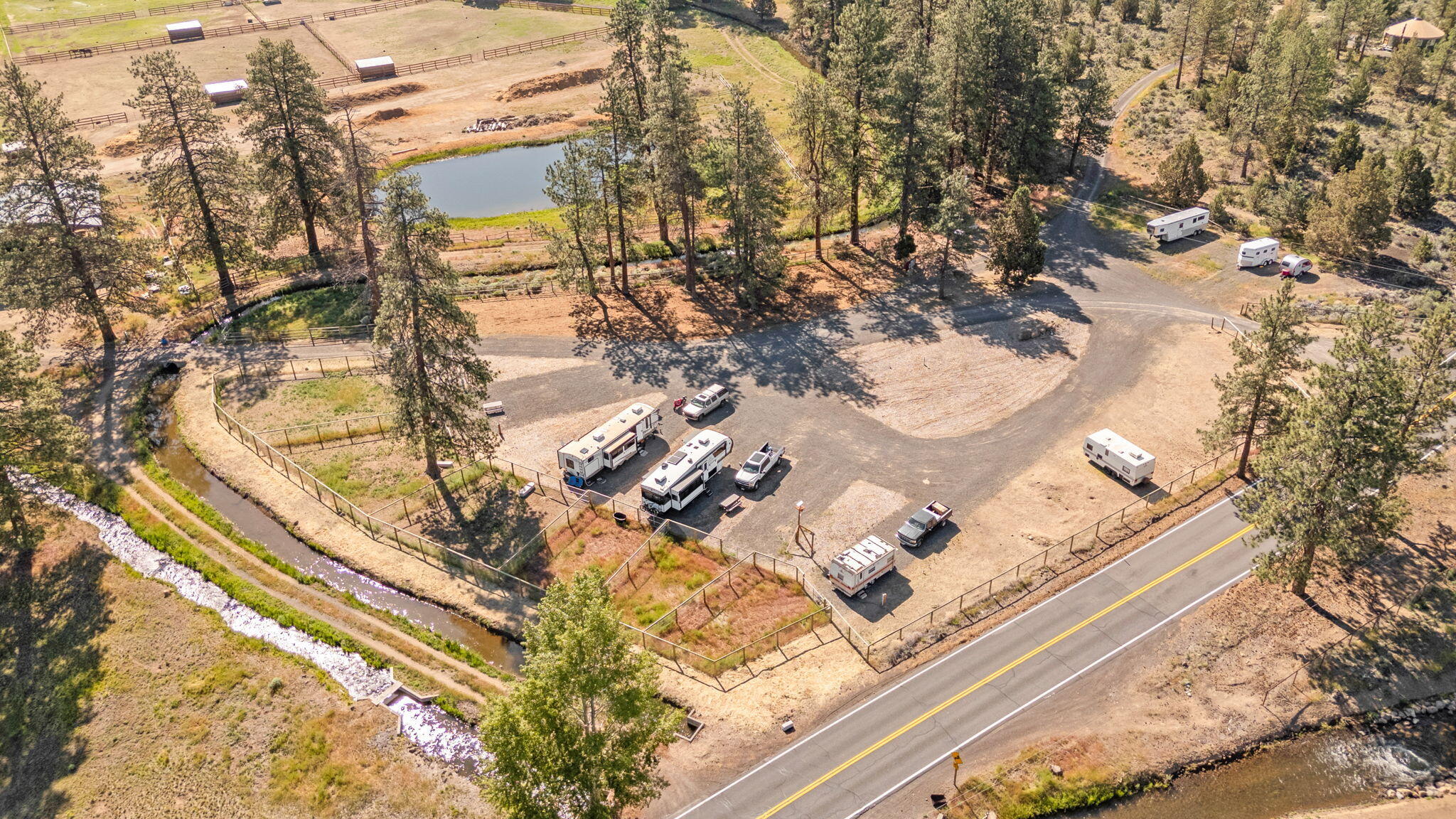 60360 Horse Butte Road Bend, OR 97702 - Photo 8 of 58 a view of a yard with a tree