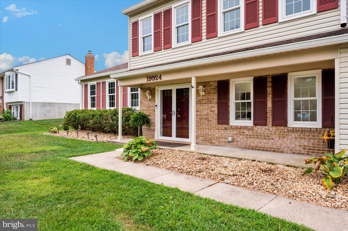 19924 Westerly Avenue Poolesville, MD 20837 - Photo 2 of 80 front view of a house with a yard