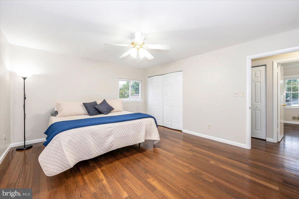 19924 Westerly Avenue Poolesville, MD 20837 - Photo 23 of 80 a bedroom with a bed and wooden floor
