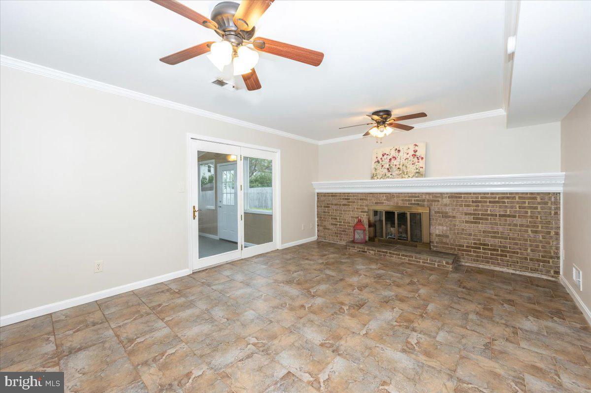 19924 Westerly Avenue Poolesville, MD 20837 - Photo 32 of 80 a view of a livingroom with a fireplace
