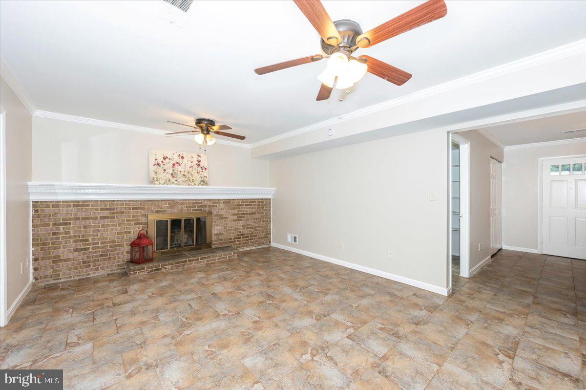 19924 Westerly Avenue Poolesville, MD 20837 - Photo 34 of 80 Cozy wood burning Brick Fireplace