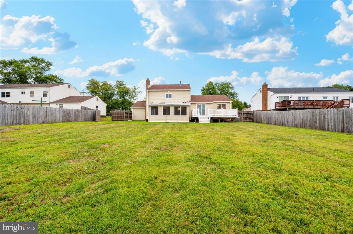 19924 Westerly Avenue Poolesville, MD 20837 - Photo 51 of 80 a view of a house with a big yard and large trees
