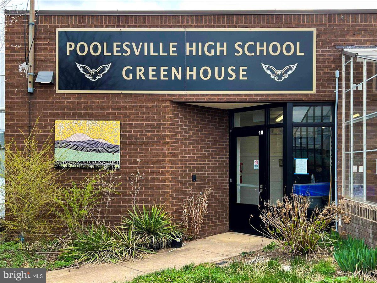 19924 Westerly Avenue Poolesville, MD 20837 - Photo 64 of 80 a sign broad in front of a brick building